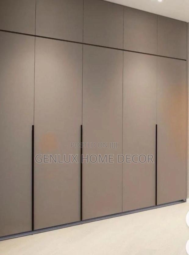 Floor-to-Ceiling Wardrobes for Maximum Storage · Photo 1