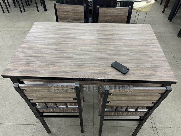 Dining Table With Four Seater Chairs · Photo 3