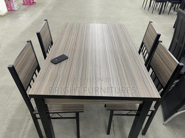 Dining Table With Four Seater Chairs · Photo 4