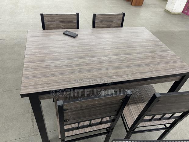 Dining Table With Four Seater Chairs · Photo 1