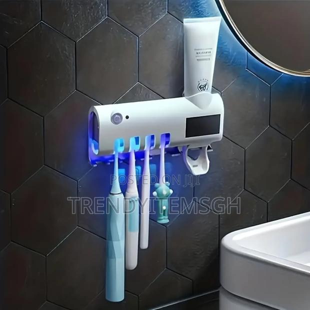 Multifunction Toothpaste Sterilizer Dispenser · Photo 1