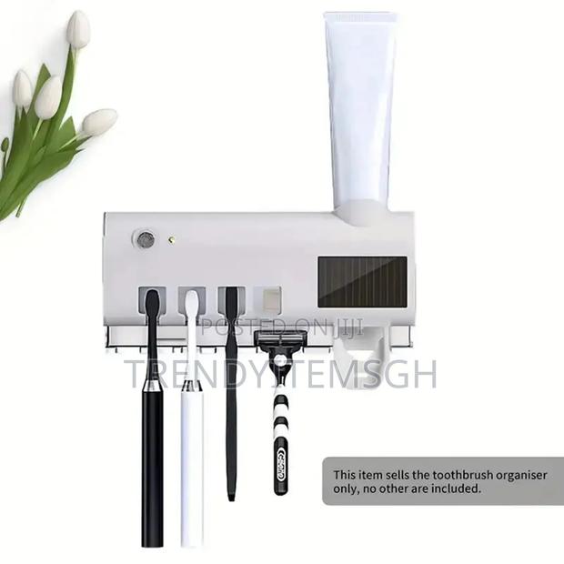 Multifunction Toothpaste Sterilizer Dispenser · Photo 2