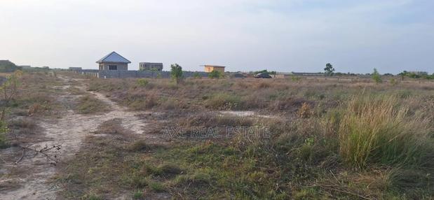 Valuable Gated Half Plot at Prampram Beach Road · Photo 1