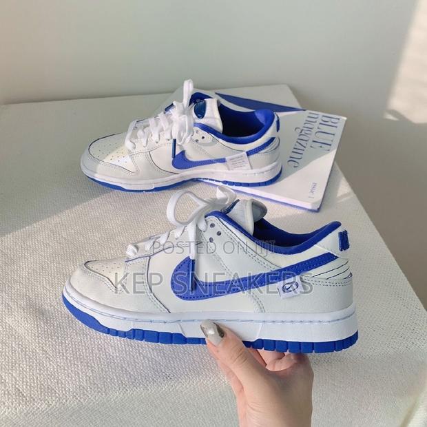 Nike Dunk Low “Ivory Hyper Royal Gs” · Photo 4