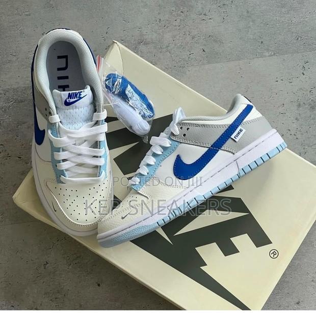 Nike Dunk Low “Ivory Hyper Royal Gs” · Photo 3