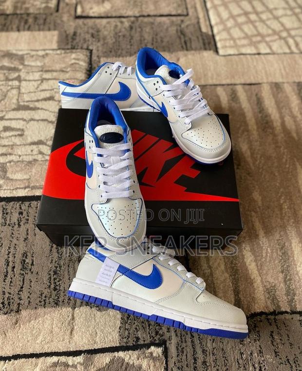 Nike Dunk Low “Ivory Hyper Royal Gs” · Photo 2