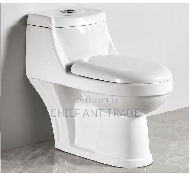 Water Closet. Toilet Seat. 125 · Photo 1