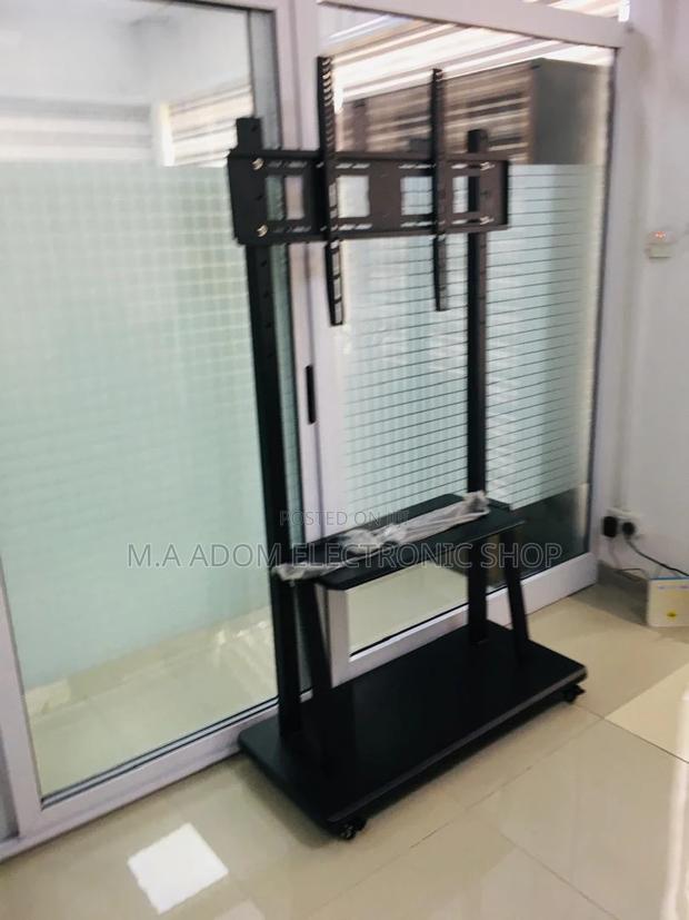 Heavy Duty Rolling TV Cart for 60"-100" Screens · Photo 1