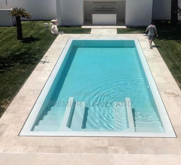 Backyard Swimming Pool · Photo 1
