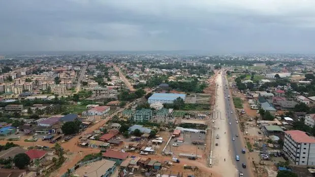 Busy Main Road Side 2 and Half Plots for Sale at Adenta · Photo 1