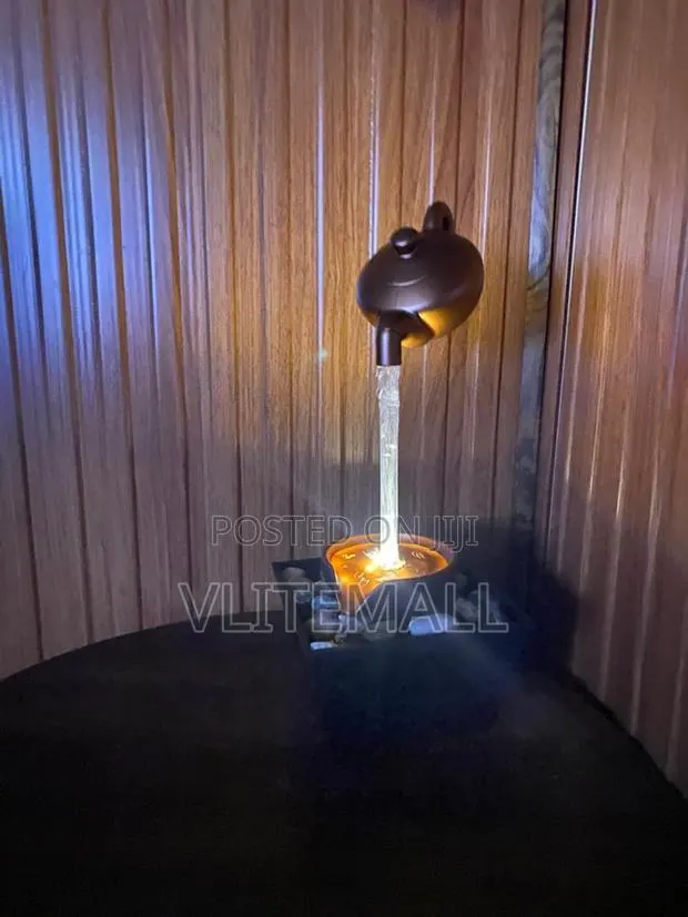 Indoor Teapot-Themed Tabletop Water Fountain Featuring Led Lighting. · Photo 1