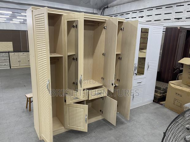 Modern Foreign 4 Doors Wardrobe With Drawers and Mirror · Photo 3