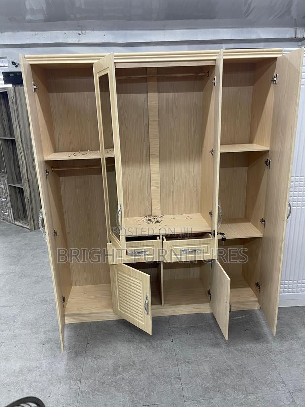 Modern Foreign 4 Doors Wardrobe With Drawers and Mirror · Photo 2