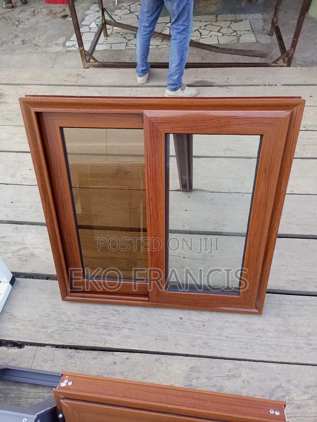 Aluminum Glass Window Wood Color · Photo 1