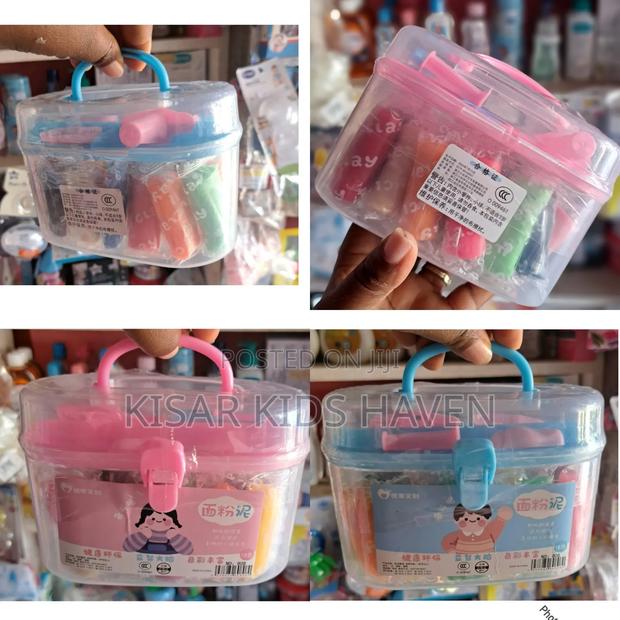 Kids Play Dough in a Container With Moulding Things · Photo 1