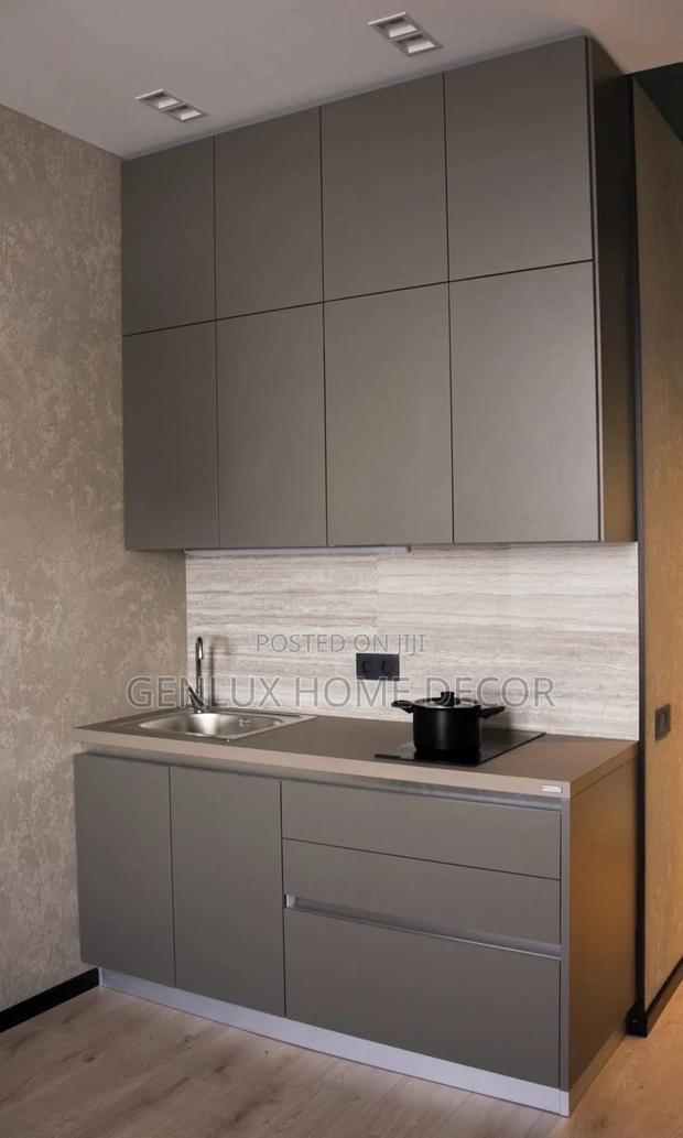 Minimalist Matte-Finish Kitchen Cabinets for a Modern Touch · Photo 1