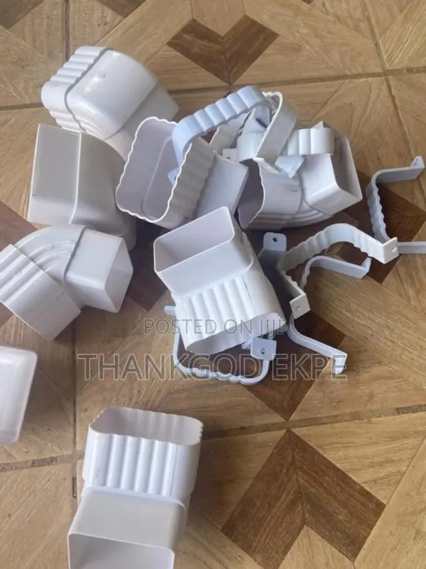 White Rain Gutter and Pipes · Photo 1