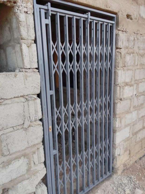 Collapsible Door Burglar Proof · Photo 1