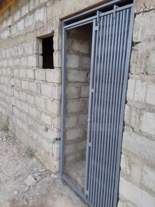 Collapsible Door Burglar Proof · Photo 5