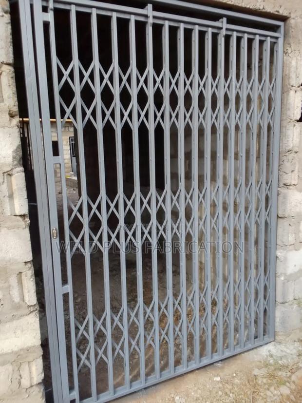 Collapsible Door Burglar Proof · Photo 1