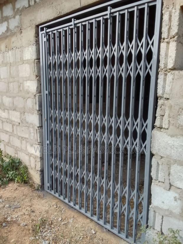 Collapsible Door Burglar Proof · Photo 3
