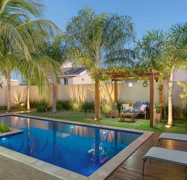 Swimming Pool Designs for Your Backyard · Photo 2