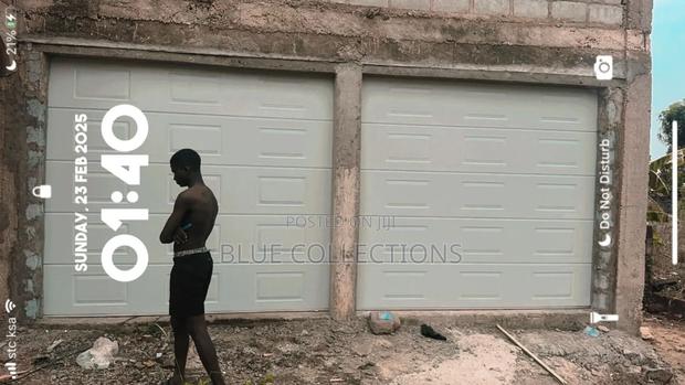 Double Garage Doors · Photo 1