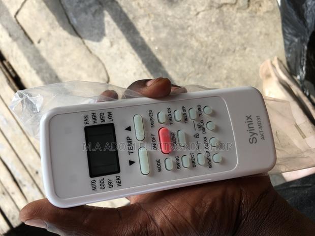 Original Syinix R410 Air Conditioner Remote · Photo 1