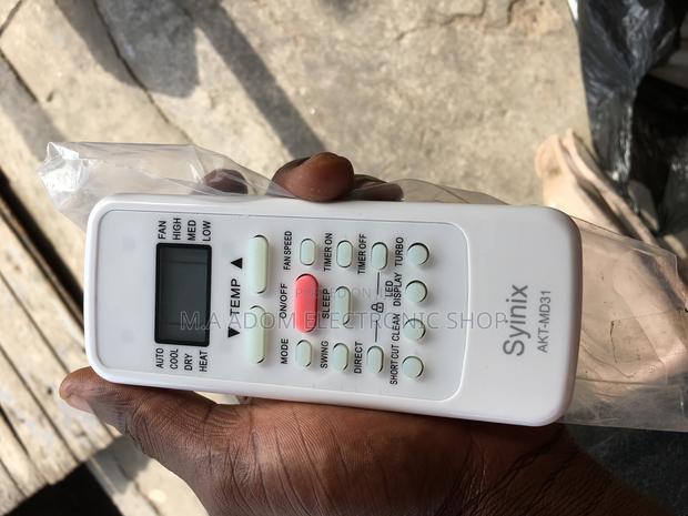 Original Syinix R410 Air Conditioner Remote · Photo 2