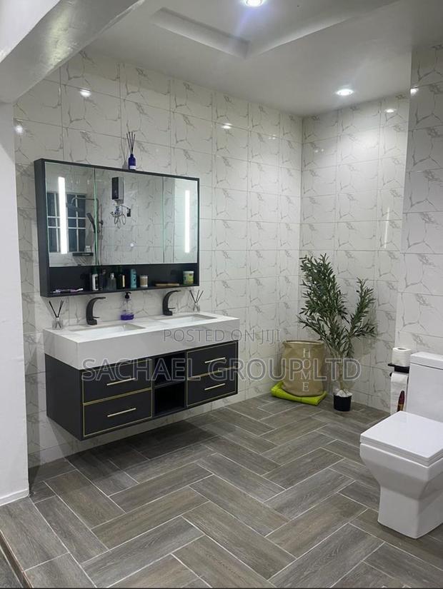 Double Sink Vanity Cabinet · Photo 1