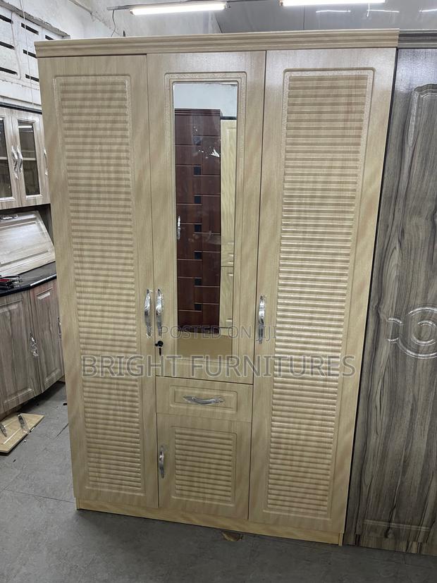 Foreign Modern Three Doors Storage Wardrobe · Photo 1