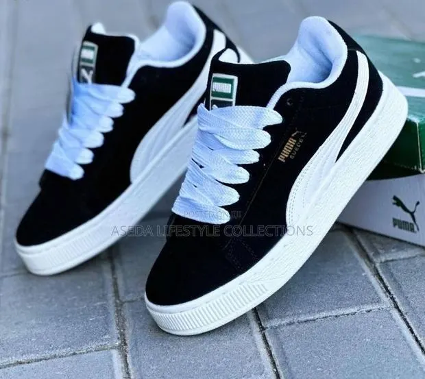 Puma Sneakers · Photo 1