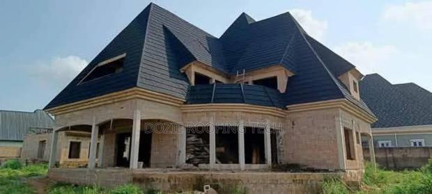 Parapet Design and Roofing Sheet Installation · Photo 1