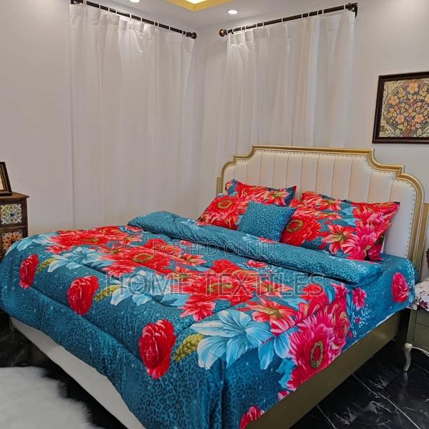 Duvet and Bedsheet With 4pillow Cases and 1throw Pillow Case · Photo 1