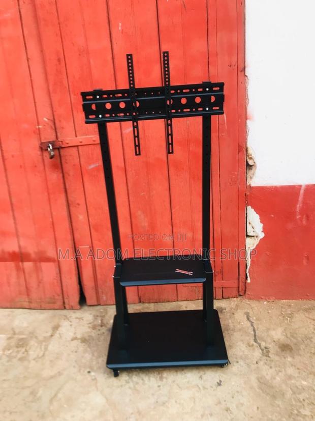 Heavy Duty Frame Tv Stand With Wheels · Photo 1