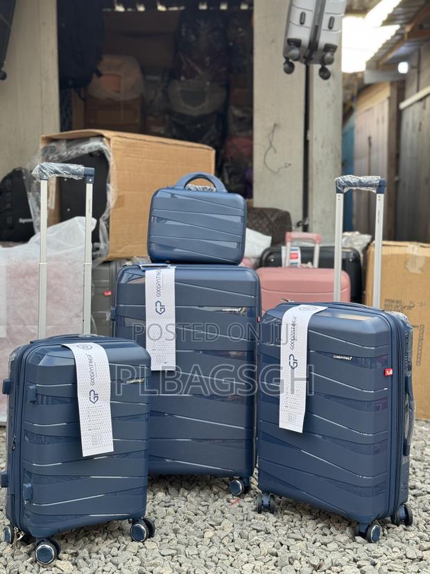 Four PCS 20/24/28 Inches and a Cosmetic Trolley Luggage · Photo 2