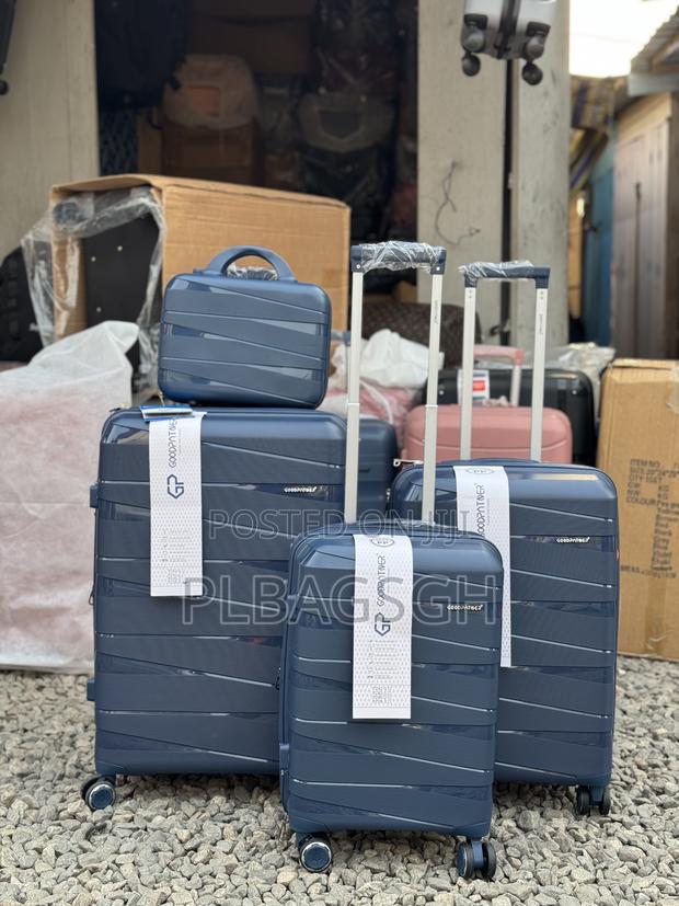 Four PCS 20/24/28 Inches and a Cosmetic Trolley Luggage · Photo 3
