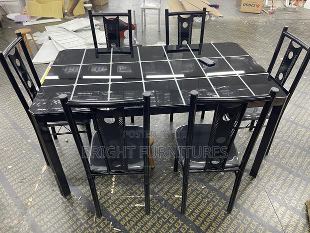 Glass Dining Table With Six Chairs · Photo 1