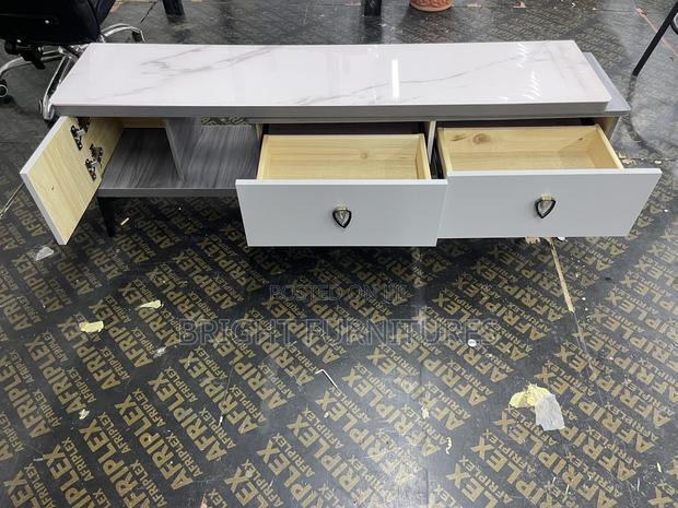 Modern Luxury Adjustable Glass Top Tv Stand With Drawers · Photo 2