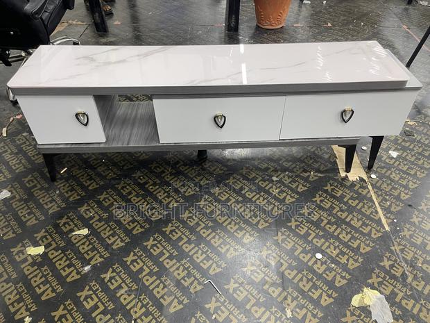 Modern Luxury Adjustable Glass Top Tv Stand With Drawers · Photo 1