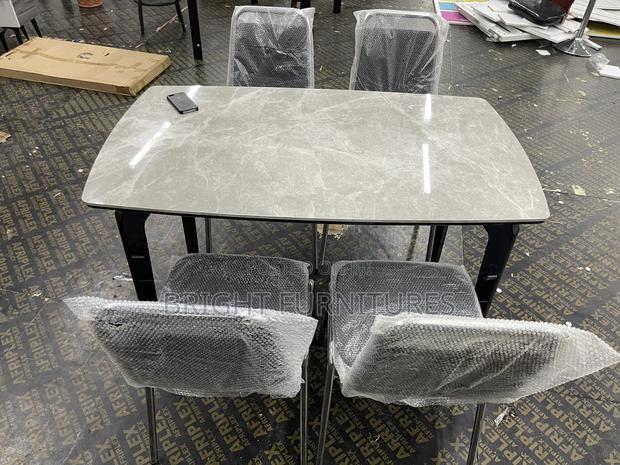 Dining Table With 4 Chairs With Marble Top · Photo 1