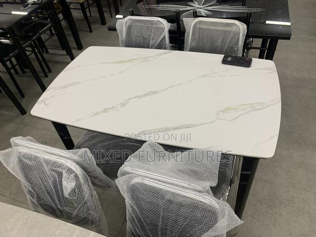 Marble Dining Table With Chairs for Living Rooms · Photo 2