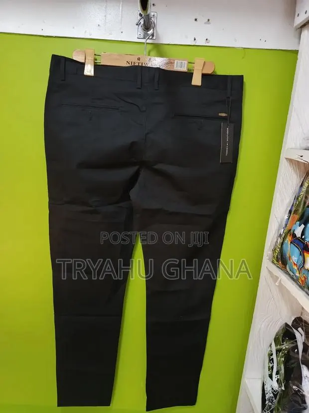 A Black Tommy Hilfiger Khaki Trourser That Looks Good · Photo 1