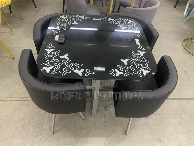 Glass Dining Table Top With 4 Leather Chairs · Photo 1