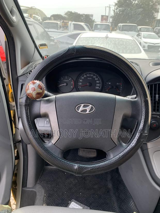 Hyundai Starex 2014 Yellow · Photo 3