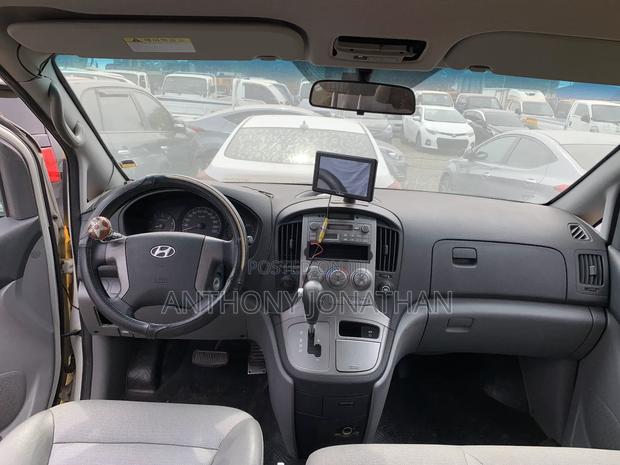 Hyundai Starex 2014 Yellow · Photo 4