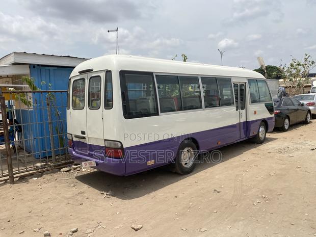 Toyota Coaster 2009 White · Photo 5