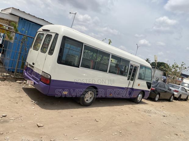 Toyota Coaster 2009 White · Photo 4