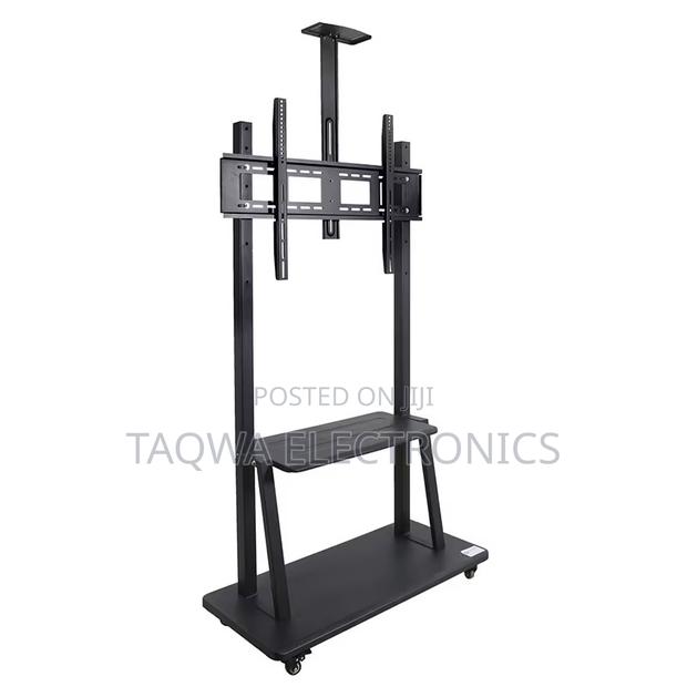 Holding 32-75, Mobile Tv Stand · Photo 1