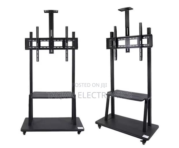 Solid -Rolling 32-75 Tv Stand · Photo 1